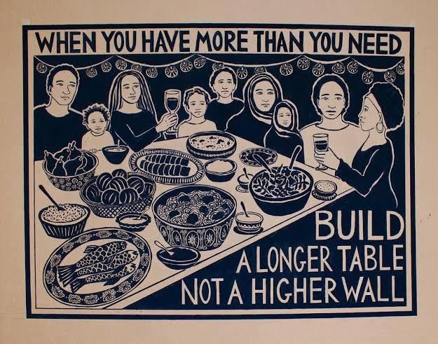 Illustration of a diverse community sharing a meal at one long table, with the words: When you have more than you need, build a longer table, not a higher wall
